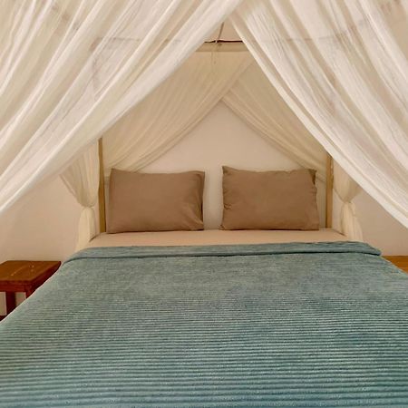 The Village Rua Beach Homestay Bagian luar foto