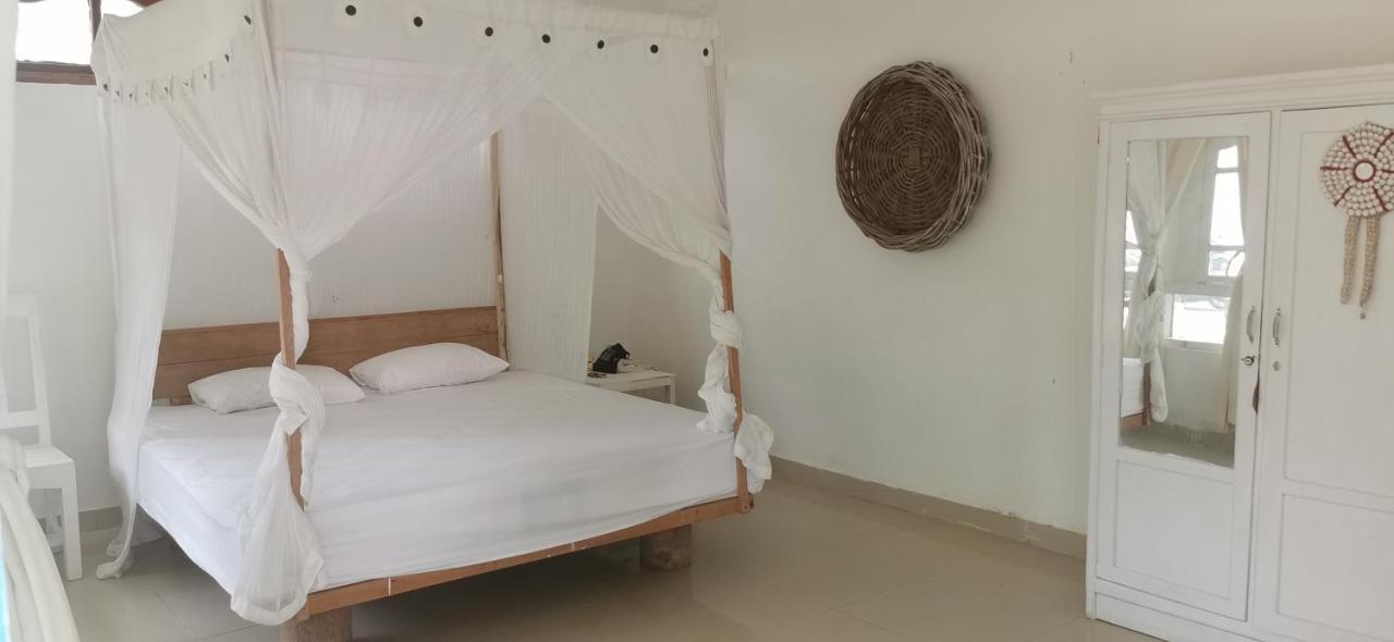 The Village Rua Beach Homestay Bagian luar foto