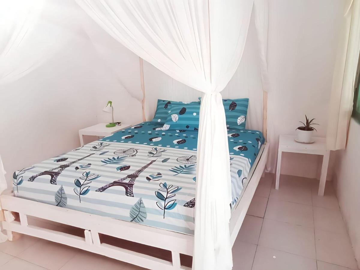 The Village Rua Beach Homestay Bagian luar foto