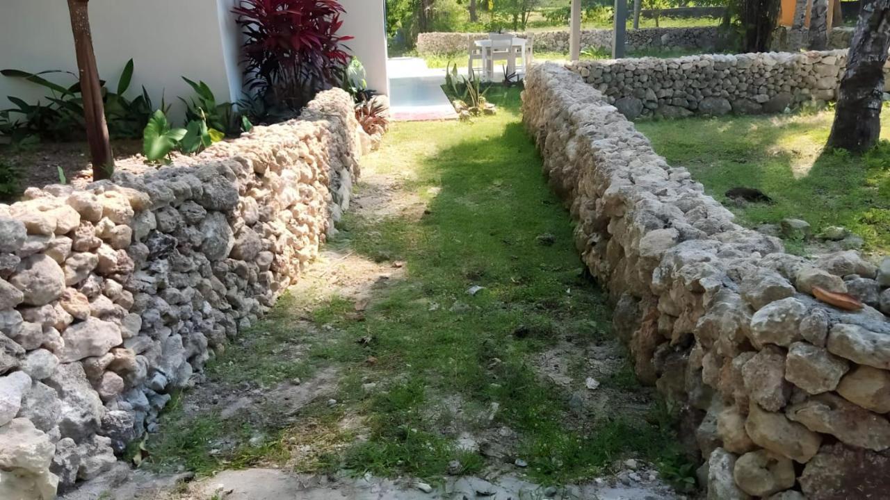 The Village Rua Beach Homestay Bagian luar foto