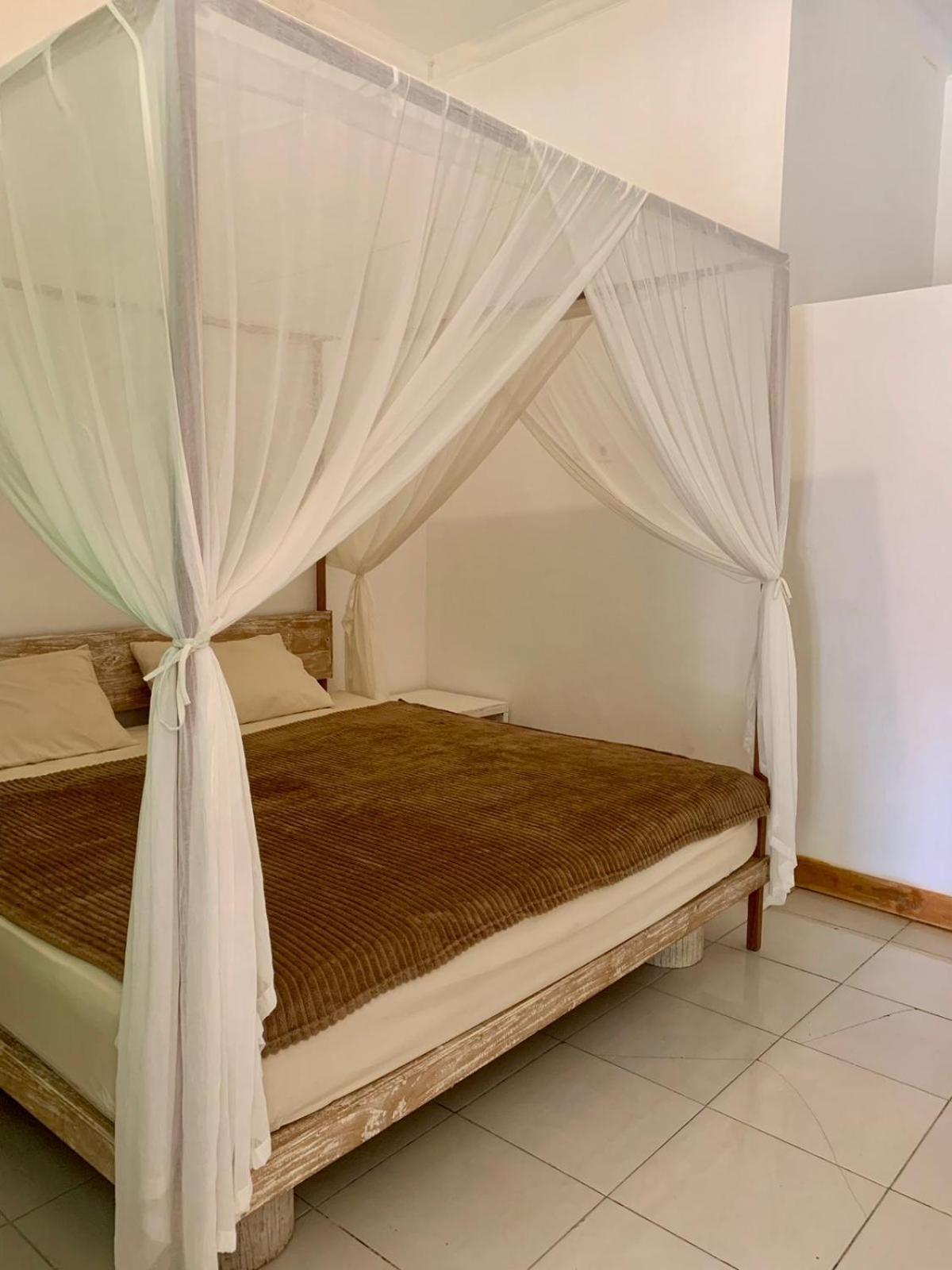 The Village Rua Beach Homestay Bagian luar foto