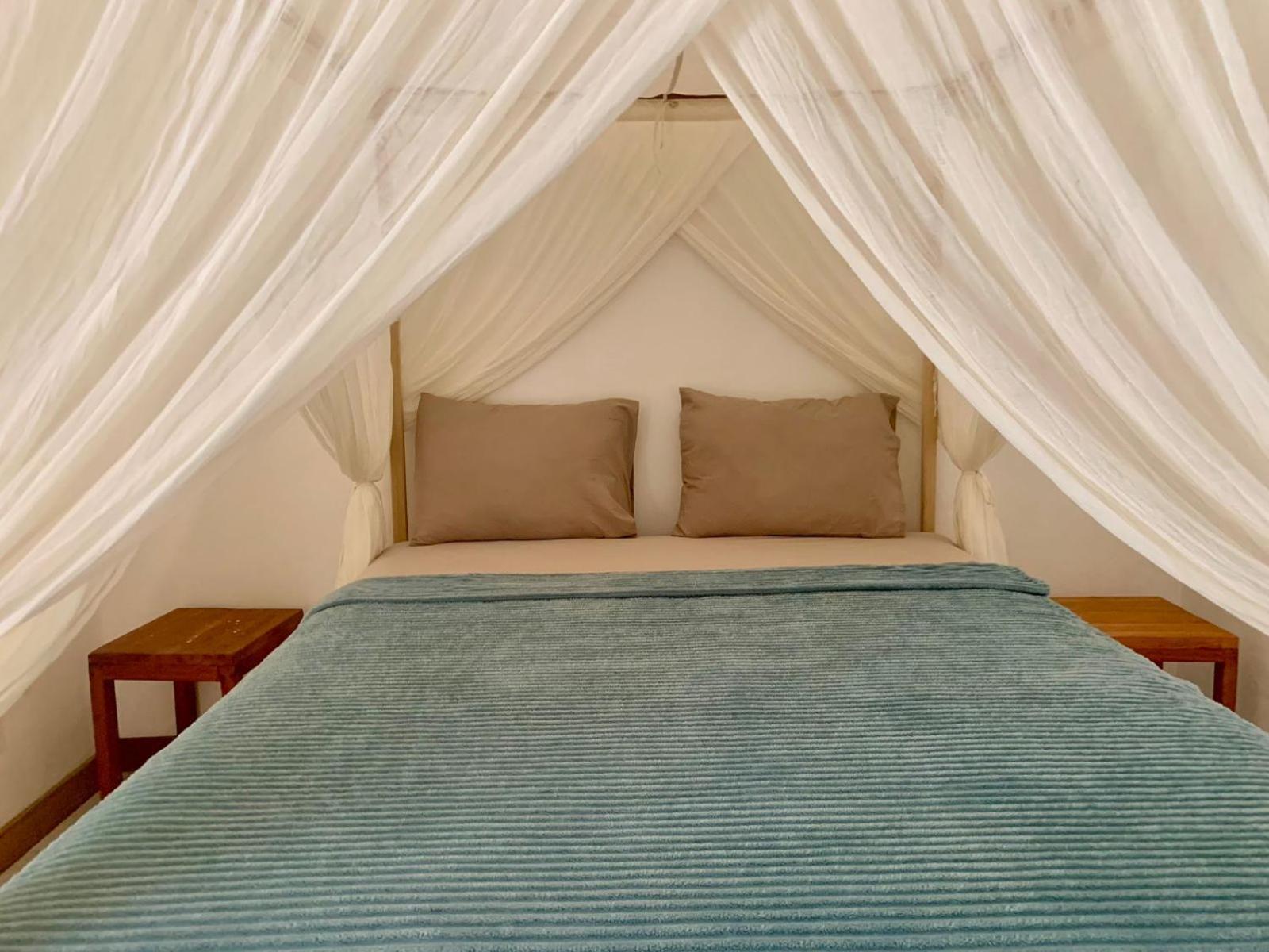 The Village Rua Beach Homestay Bagian luar foto