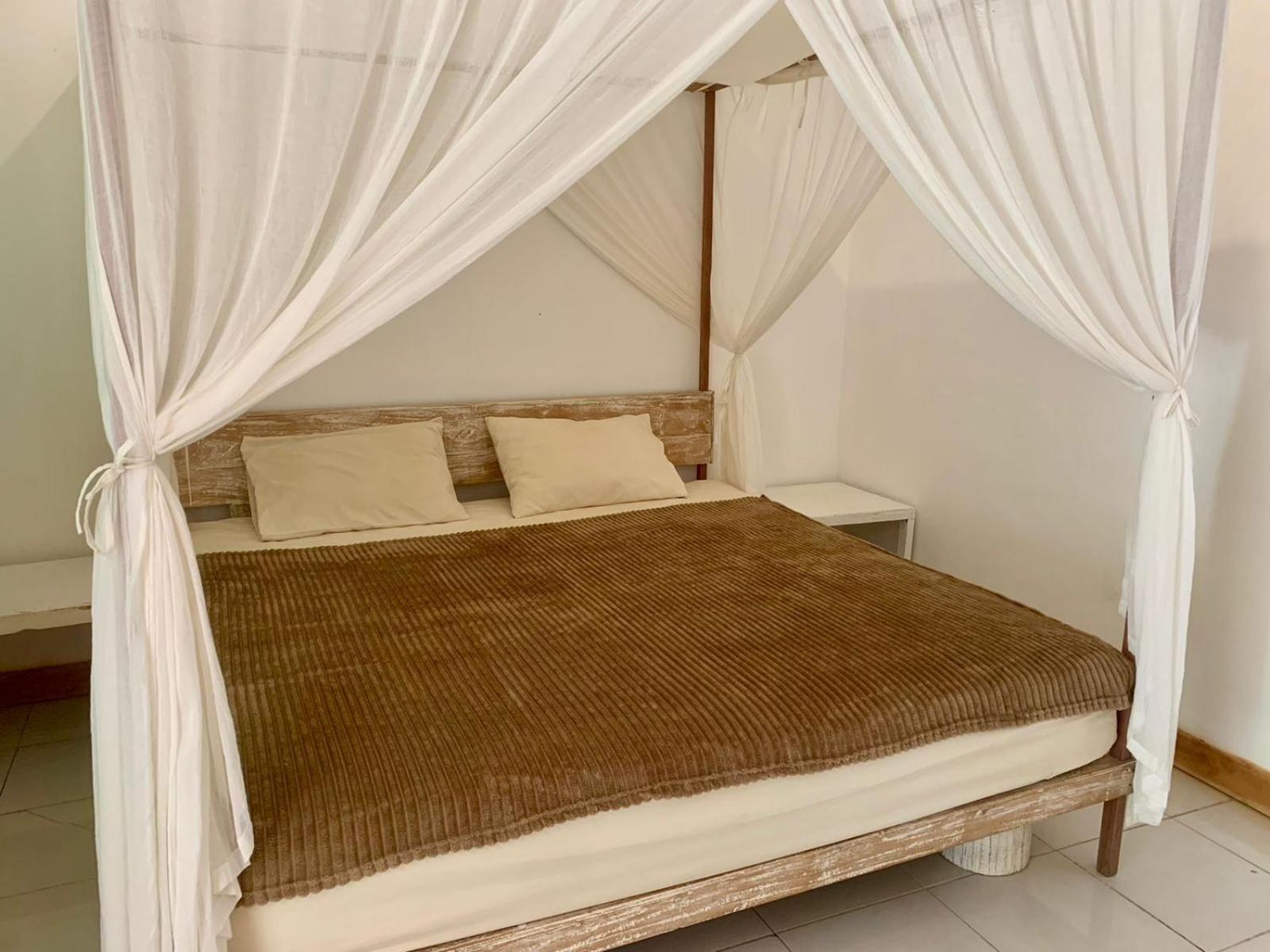 The Village Rua Beach Homestay Bagian luar foto