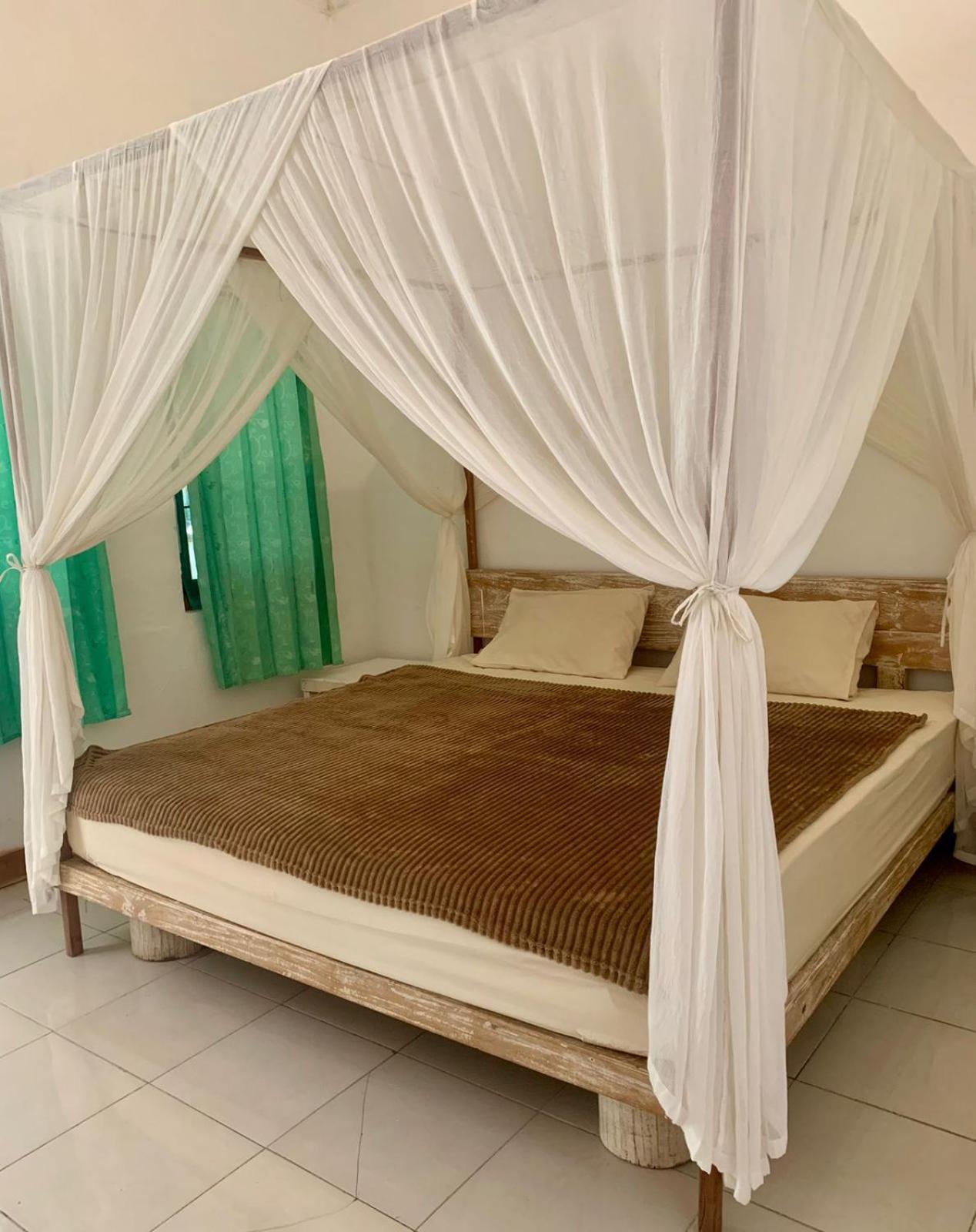 The Village Rua Beach Homestay Bagian luar foto